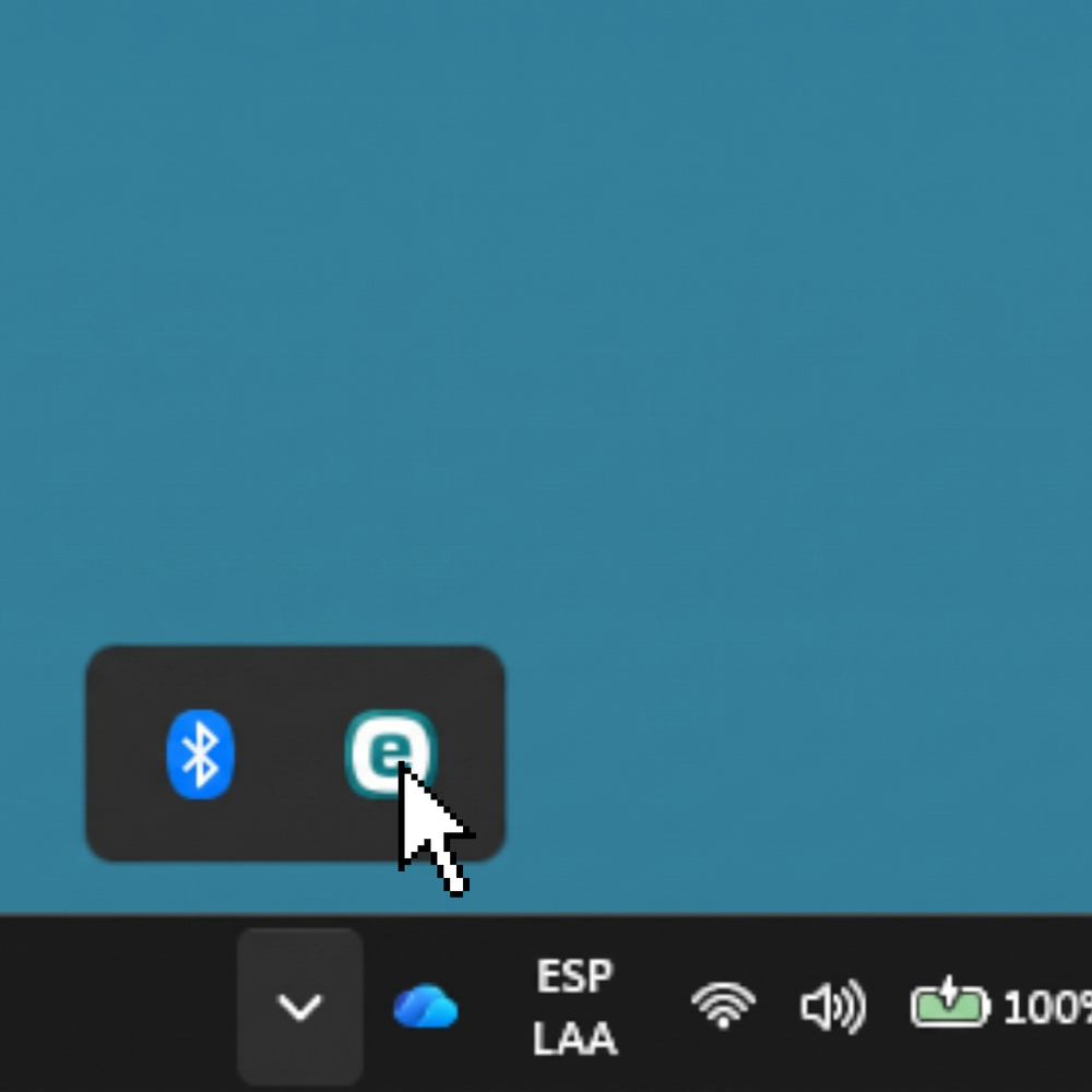 1. Abre tu programa ESET desde los iconos ocultos de Windows.